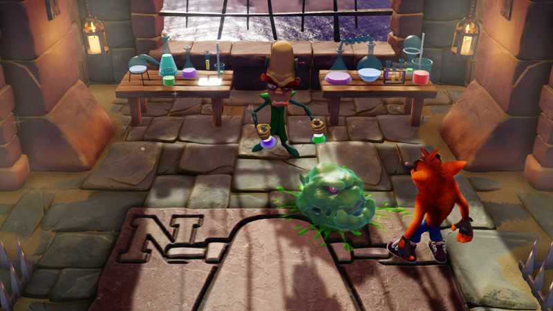 Dr. Nitrus Brio stands in his lab with some beakers in hand. Crash is standing in front of him, while a sentient blob with a face looks menacingly at the latter.