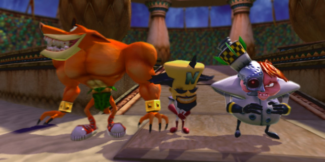 Tiny, Cortex, and N. Gin stand in front of a winner's podium.